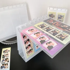 Close-up of a desktop acrylic mushroom ring photo album designed for 4-cut photo strips display