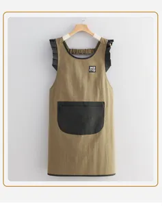 Stylish waterproof kitchen apron with ruffles and zipper pocket, perfect for daily cooking, baking.