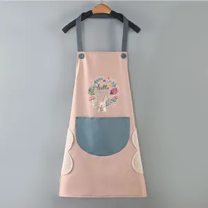 Waterproof kitchen apron with pockets, cute floral bunny print and side hand towels for cooking.