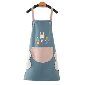 Waterproof kitchen apron with cute rabbit print, pink pocket and handy side hand towels.