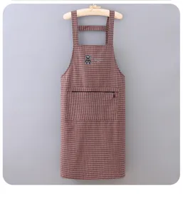 Cotton checkered kitchen apron with zipper pocket, sleeveless long design for home cooking use.