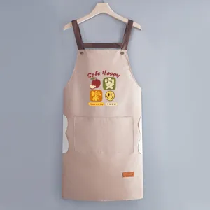 Cute Japanese style waterproof kitchen apron for women, stylish household cooking bib with pockets.
