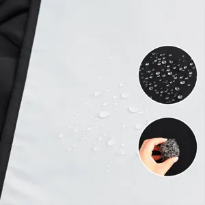 Waterproof kitchen apron fabric close-up featuring thick laminated material and oilproof design.