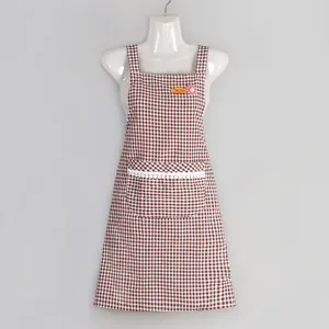 Tablier de cuisine à carreaux marron avec poche avant et bordure en dentelle coton.