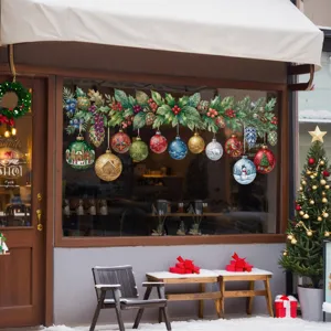 Festive Christmas window stickers with colorful baubles and red berries for holiday atmosphere