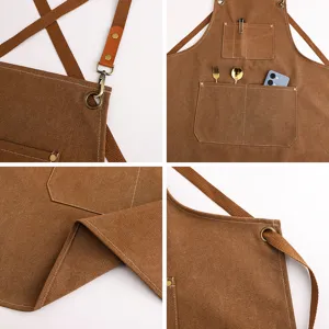 Grembiule da lavoro in tela spessa con tasche multiple e comodi spallacci regolabili.