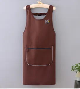 Brown sleeveless kitchen apron with zipper pocket detail, hanging on wooden clothes hanger.