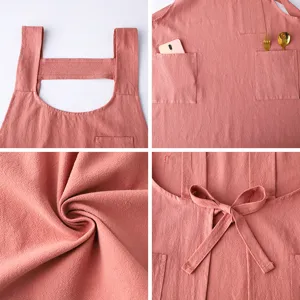 Japanese style cotton linen pink apron with multi pockets and cross straps for cooking and art work.
