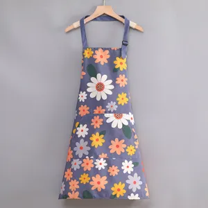 Elegante delantal de cocina de lona con estampado de flores coloridas y bolsillo frontal.
