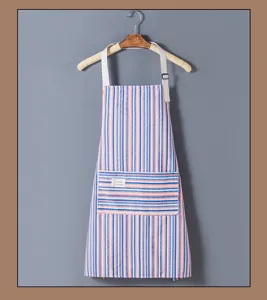 Striped kitchen apron detail, adjustable white straps and front pocket design for cooking use.
