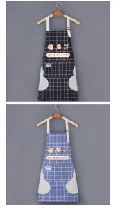 Wipeable hand kitchen apron with waterproof grid design, dual fleece pockets for convenience.