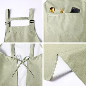 Light green kitchen apron with adjustable straps, pockets, and waterproof fabric for cooking.
