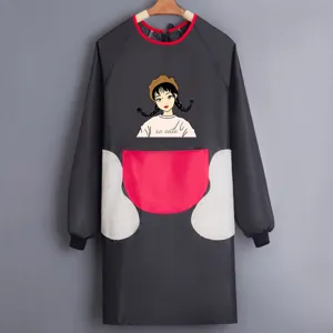 Detailed view of waterproof long-sleeve kitchen apron with cute cartoon print and fleece pockets.