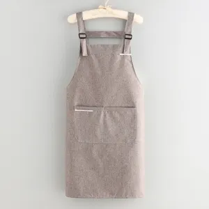 Waterproof kitchen apron for cooking baking, sleeveless household workwear with pockets.