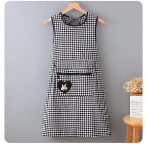 Black and white plaid kitchen apron with zipper pocket and cute rabbit heart detail.