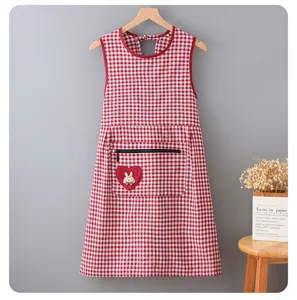 Red checkered kitchen apron with zipper pocket and cute rabbit heart patch, stylish.