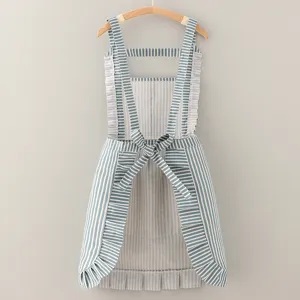 Cotton linen striped kitchen apron with cross back straps and ruffles for women cooking.