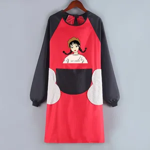 Waterproof long sleeve cooking apron with cute cartoon print and pockets for home kitchen use.