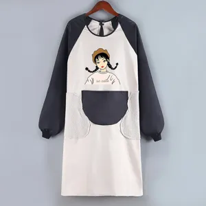 Long sleeve waterproof apron detail, cute cartoon graphic, fleece pockets, kitchen cooking.
