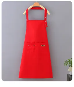 Red cotton poly work apron with front pockets and adjustable metal snap neck strap daily use