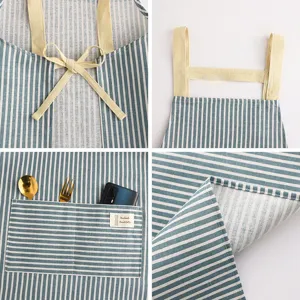 Blue and white striped cotton linen kitchen apron with yellow straps and double pockets.