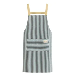 Striped cotton linen kitchen apron with cross back straps and front pocket for cooking home