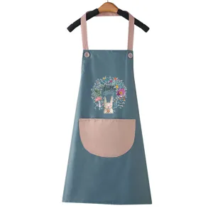 Stylish waterproof kitchen apron for women, cute floral rabbit print with convenient front pocket.