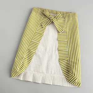 Green and white striped cotton linen half apron for women kitchen cooking wear flat lay