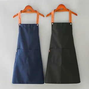 Delantal de trabajo de lona con tirantes marrones y bolsillos, elegante delantal de cocina.