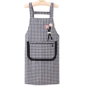 Black and white checkered kitchen apron with pocket and cute straps for home cooking.