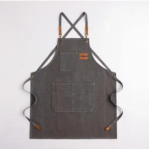 Dunkelgraue Arbeits-Schürze aus Canvas mit Kreuzbändern und Taschen für Küche und Café.