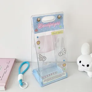 Detail showing the transparent PVC material and blue angel wing pattern of a doll display bag