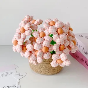 Charming fabric flower gel pens with pink plaid design arranged in a woven basket detail