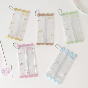 Five colorful mini transparent PVC doll storage bags with zippers and ball chains