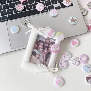 Collection of 25mm cute cartoon badges with a white fabric bow photo card holder