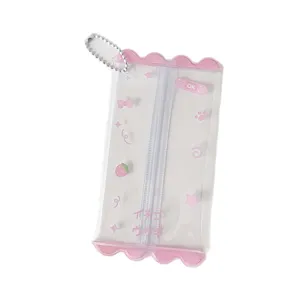 Kawaii pink scalloped mini PVC doll storage bag with keychain and cute strawberry print