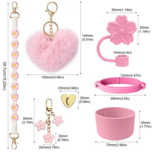 Roze Stanley bekers accessoires set met draagriem, pompon, rietje topper en siliconen beschermer.