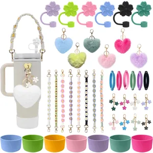 Leuke Stanley beker accessoires set met bloem rietje toppers en pluche hartjes hangers.