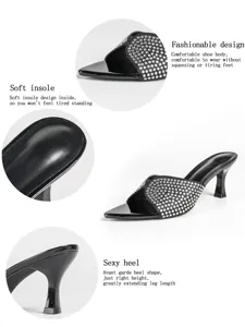 Zwarte muiltjes met strass en spitse hoge hakken, elegante feestelijke schoenen grote maten.