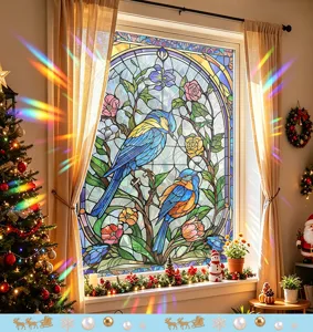 Detailed view of colorful blue bird stained glass window film in a cozy Christmas setting