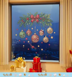 Festive Christmas window sticker featuring a wreath with ornaments and red bow decor
