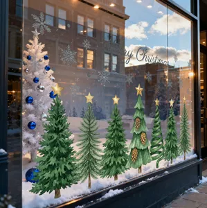 Pegatinas estáticas de pinos y copos de nieve en un escaparate de tienda