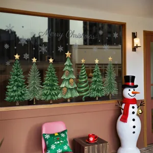 Pegatinas estáticas de árboles de Navidad para ventanas con copos y estrellas.