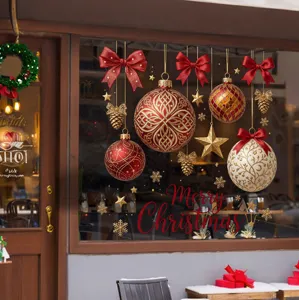 Christmas window stickers with red bows and Merry Christmas lettering on glass