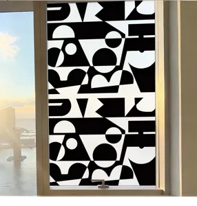 Detail view of black and white geometric abstract frosted window privacy film on glass