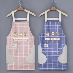 Waterproof kitchen apron with pockets and hand towels, cute grid design for cooking baking.