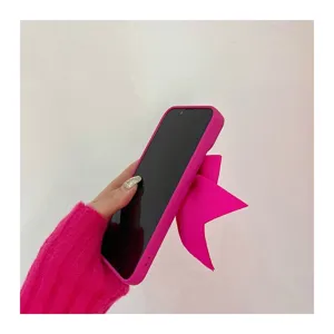 Pink 3D bow phone case detail, cute sweet style silicone protective cover for iPhone models.