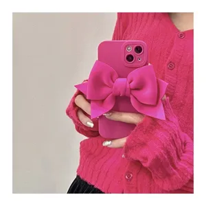 Close-up of the trendy 3D pink bow iPhone case, showing stylish sweet cute design and texture.