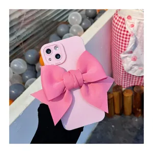 Custodia in silicone rosa con grande fiocco 3D, design elegante e carino per tutti i giorni.