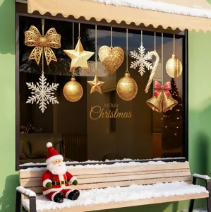 Festive gold Christmas window stickers featuring snowflakes, stars, and ornaments.